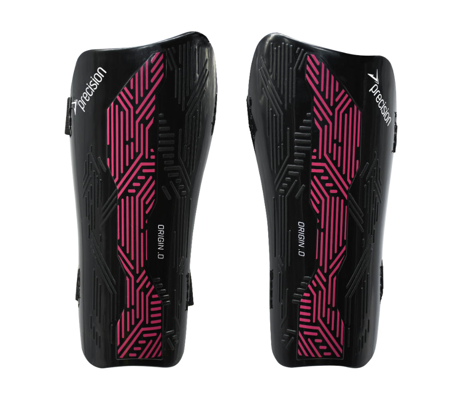 Pair of black and pink athletic shin guards with 'Dainese' branding on a white background