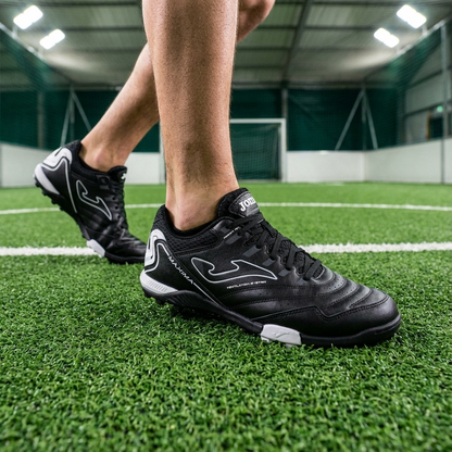 Joma cancha 2501 Turf Soccer Shoes in a turf court  without socks 