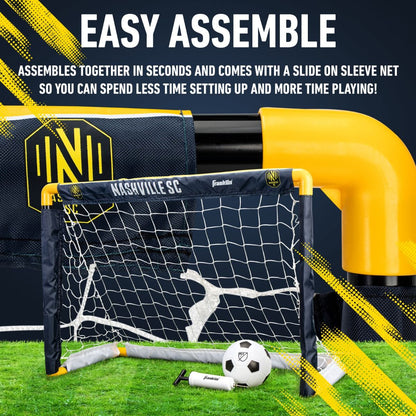 Children's soccer goal with Nashville SC branding, soccer ball, and assembly text on a grass background.